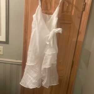 White dress, illusion wrap bow detail